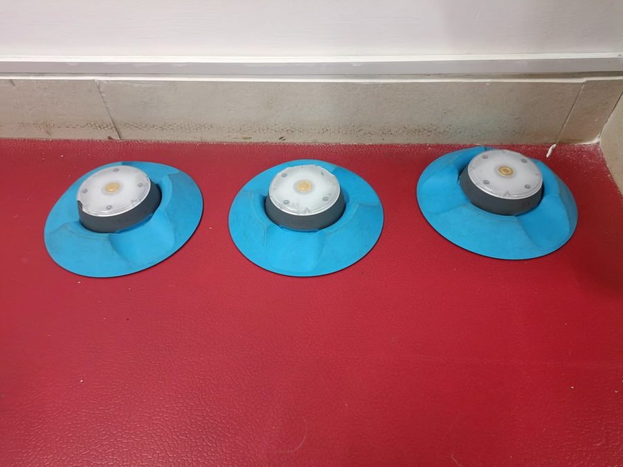 Balance discs laid out on the sports science lab floor